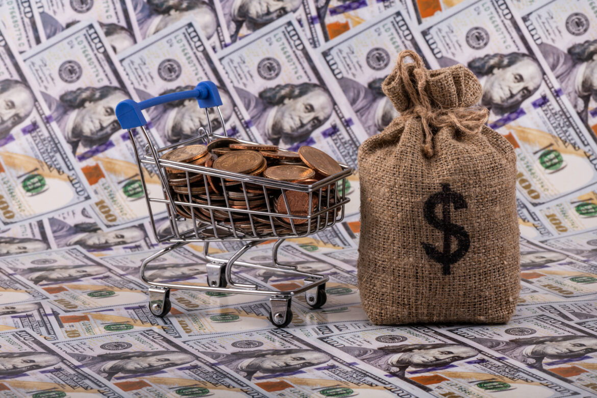 dividends-cart-full-of-money-on-hundred-dollar-bills.jpg