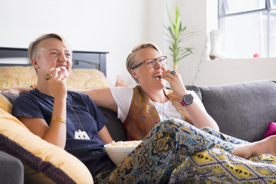 happy-couple-watching-tv-streaming-video.jpg