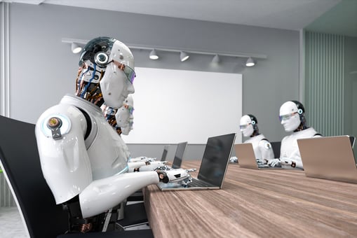 AI Artificial intelligence powered robots sitting at a conference room table typing on laptops.