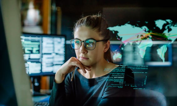 A business person examining data