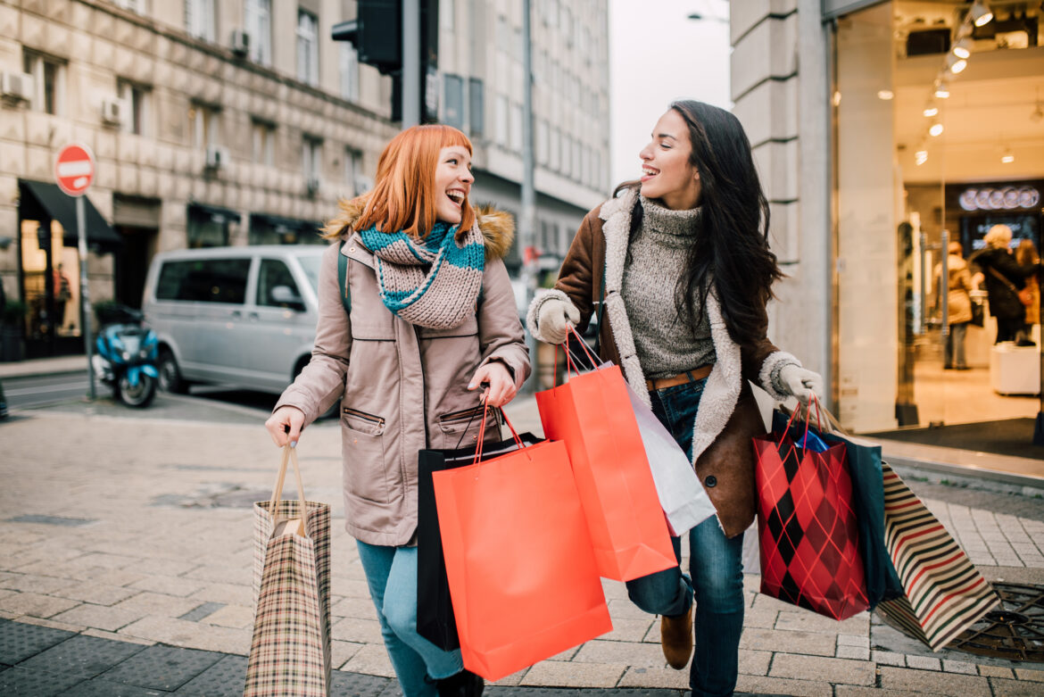 2-people-carrying-shopping-bags.jpg