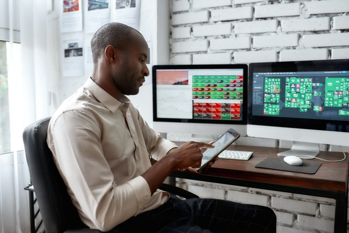 investor-looking-at-stocks-on-a-tablet.jpg
