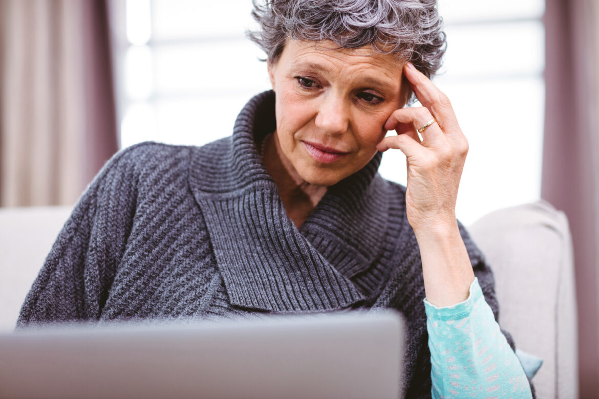 mature-person-looking-at-laptop-computer-with-raised-eyebrows-and-thinking-confused-doubtful-uncertain-unsure-skeptical.jpg