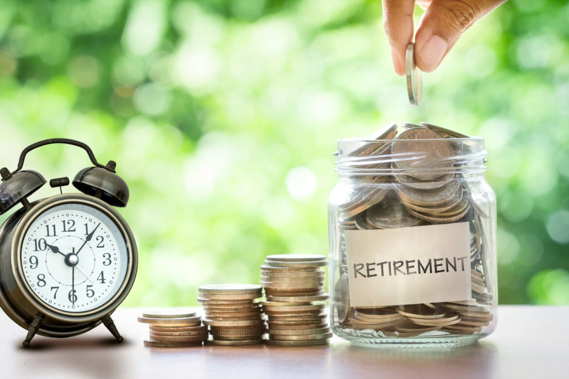 retirement-savings-jar-full-of-coins-and-alarm-clock-1.jpg