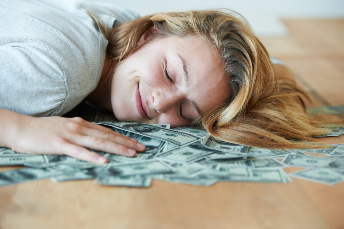 sleeping-on-100-bills.jpg