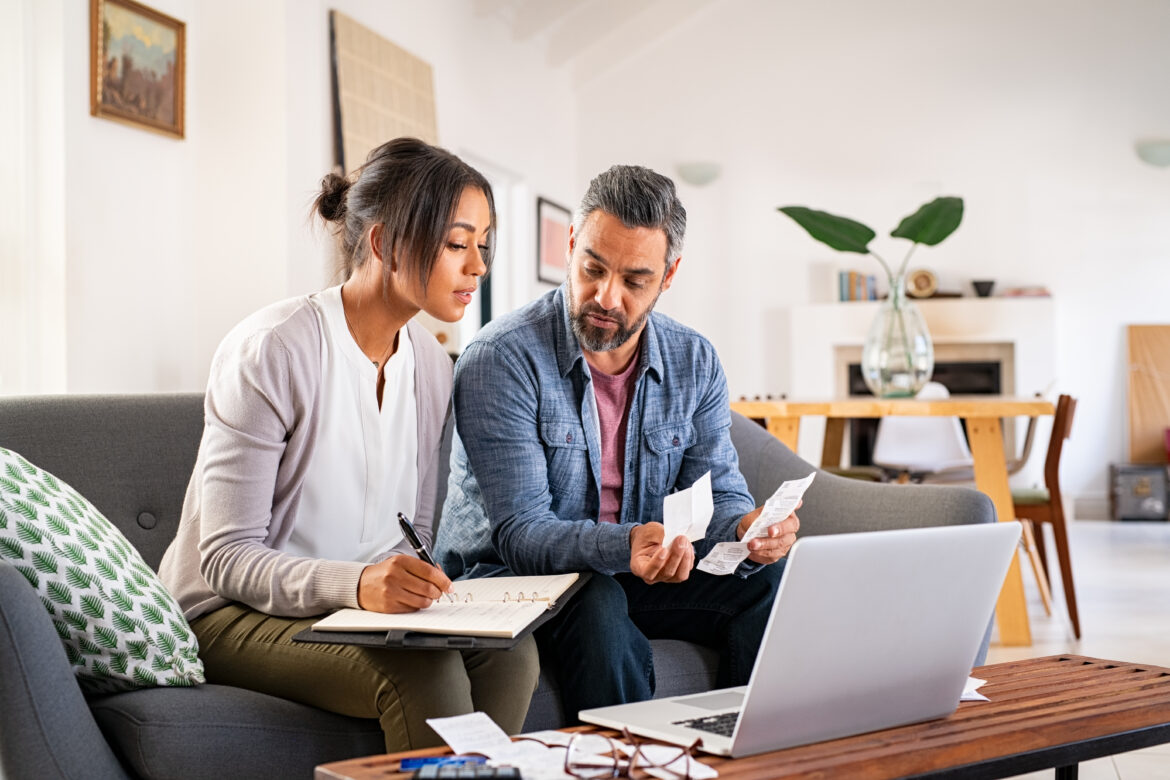 adult-couple-working-in-finances-with-receipt.jpg