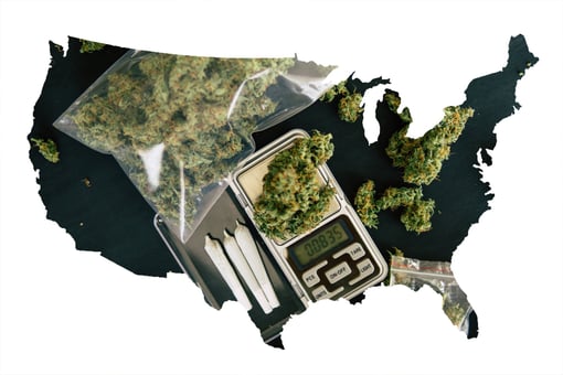 Map of America with a bag of marijuana, joints, and a scale within the outline.