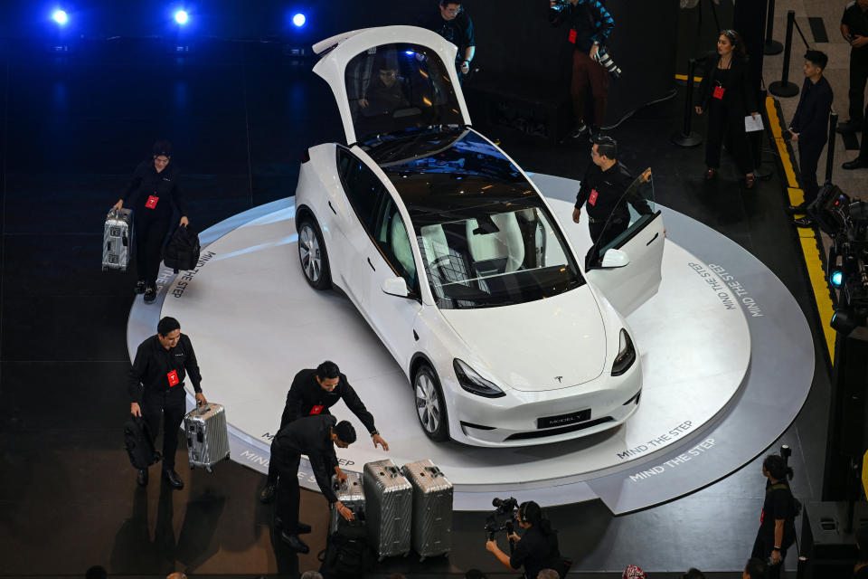 A Tesla Model Y is displayed during it's unveiling for the first time in Kuala Lumpur on July 20, 2023. (Photo by Mohd RASFAN / AFP) (Photo by MOHD RASFAN/AFP via Getty Images)