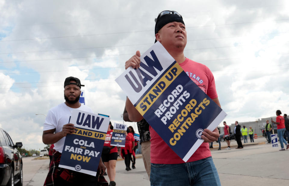 Striking United Auto Workers walk the picket line outside the Ford Michigan Assembly Plant in Wayne, Michigan, U.S. September 15, 2023. REUTERS/Rebecca Cook