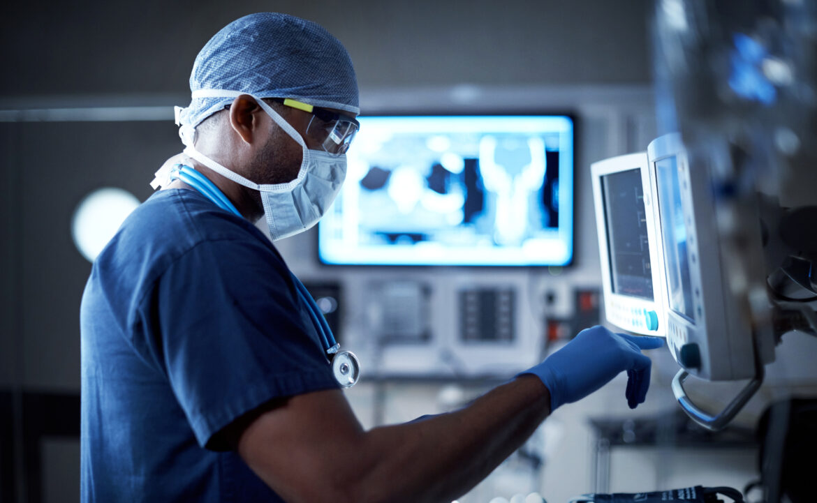 medical-professional-working-at-a-computer-terminal.jpg