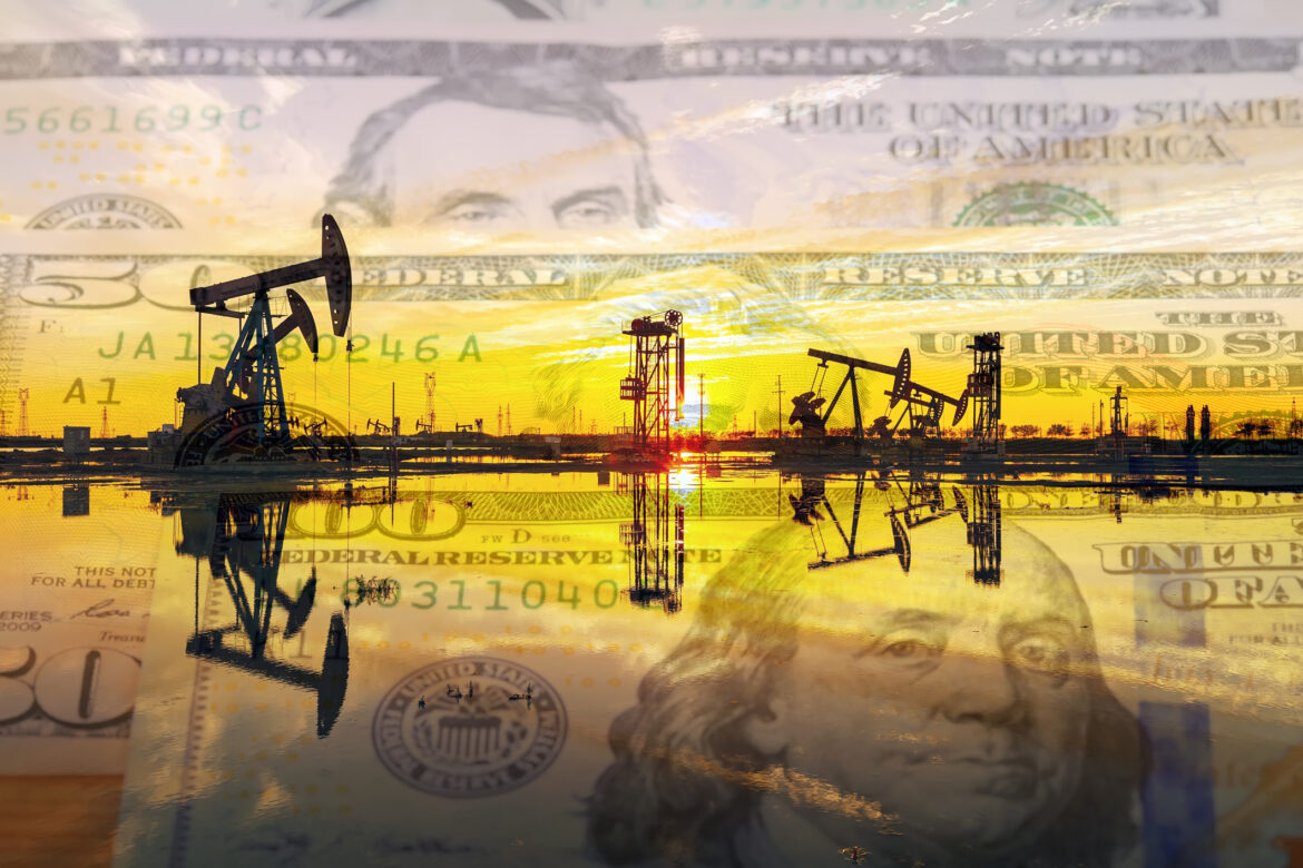 oil-pumps-at-sunrise-with-money-in-the-background.jpg