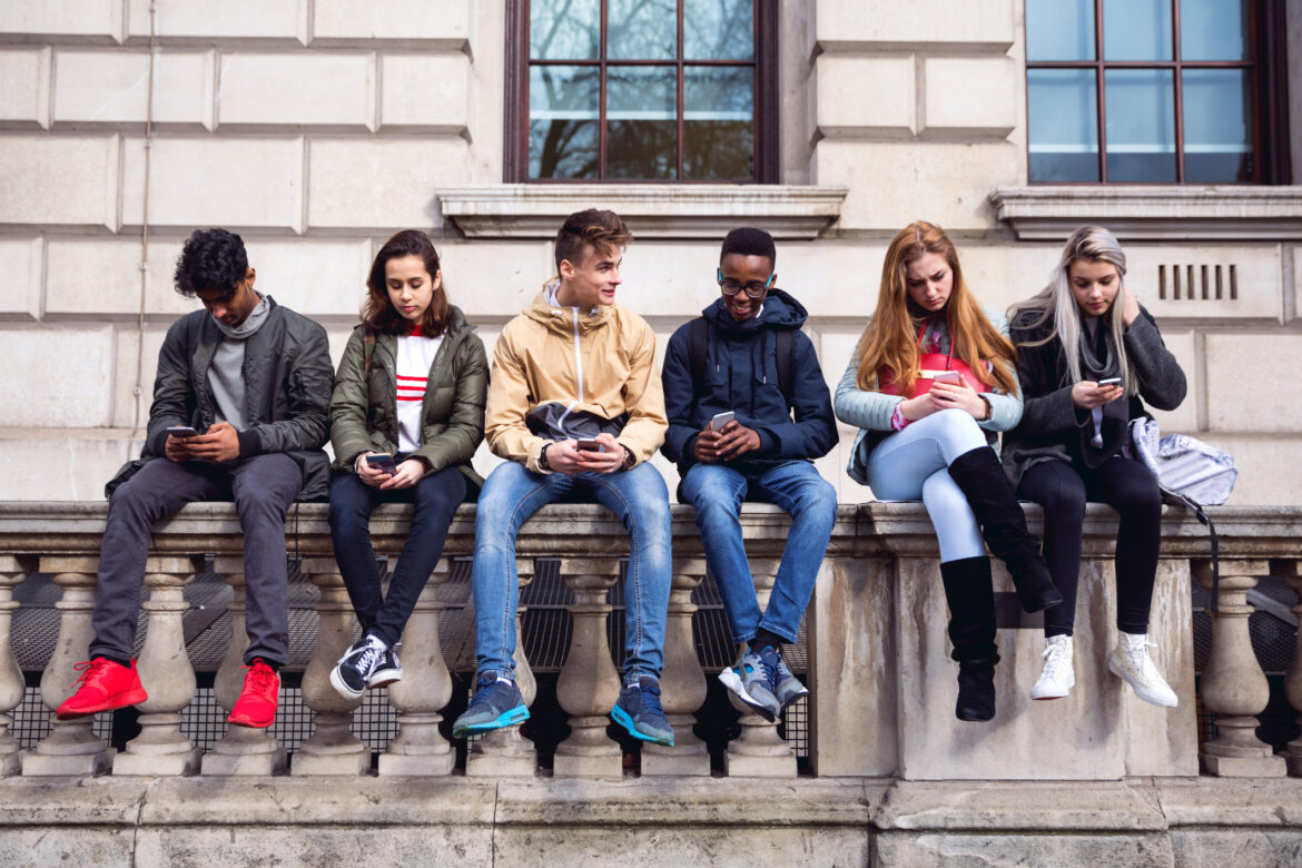 young-people-looking-at-their-cellphones.jpg