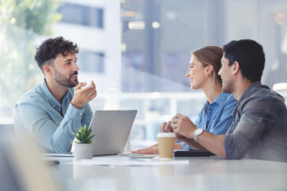 two-people-meeting-with-an-advisor-at-a-coffee-shop.jpg