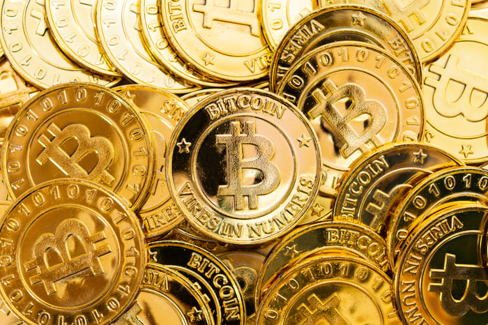 Gold bitcoins stacked on top of each other