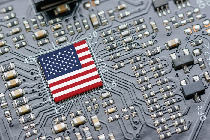 A semiconductor with a U.S. flag on it. 