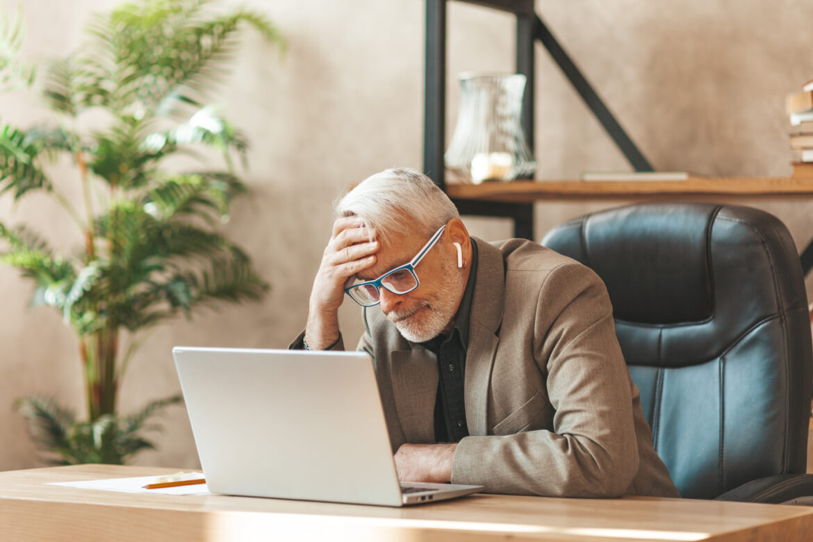 person-regretful-in-front-of-a-computer.jpg