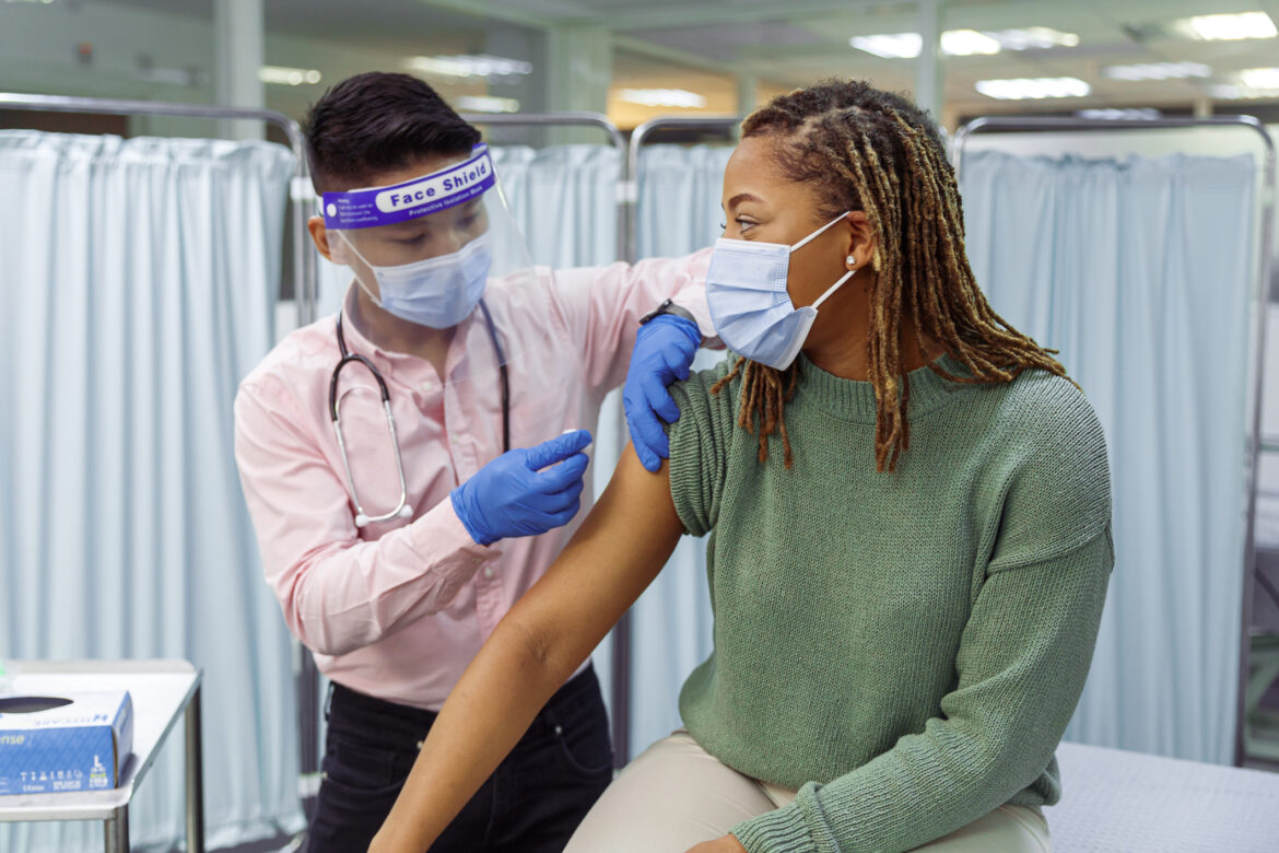 doctor-vaccinating-a-patient.jpg
