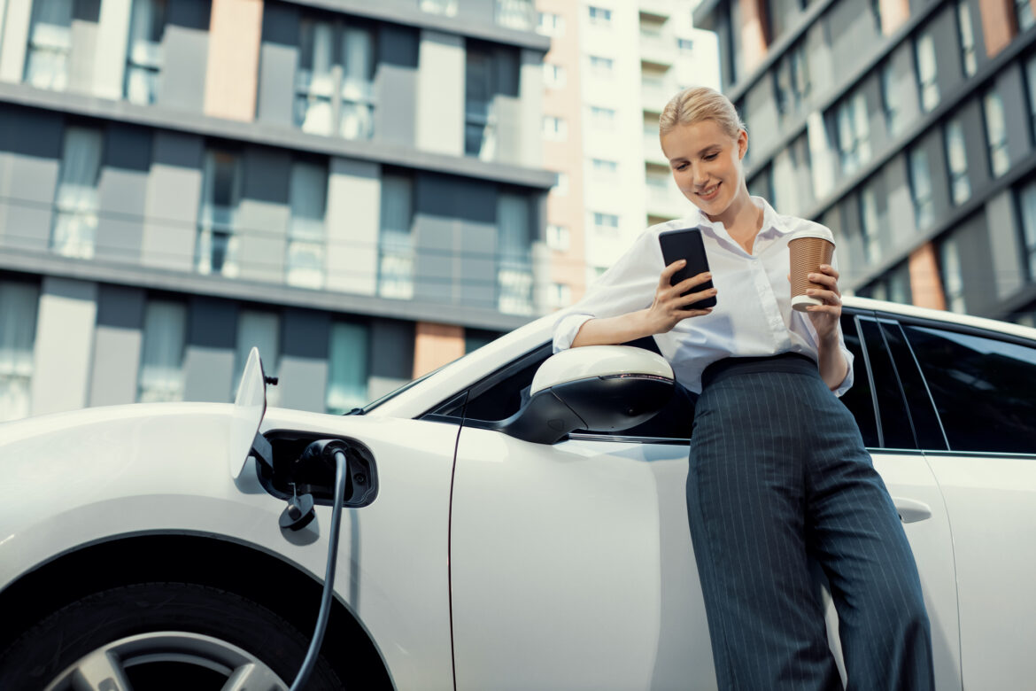 driver-waits-for-an-electric-vehicle-to-charge.jpg