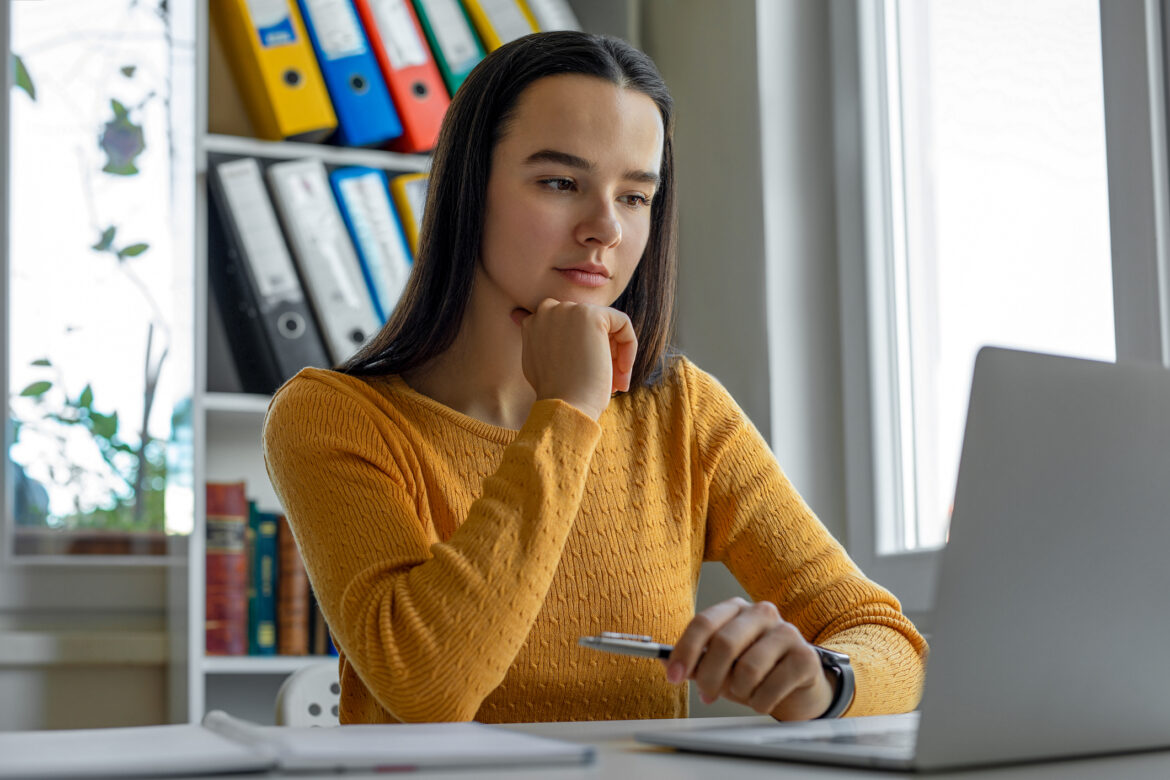 young-woman-looking-at-laptop.jpg