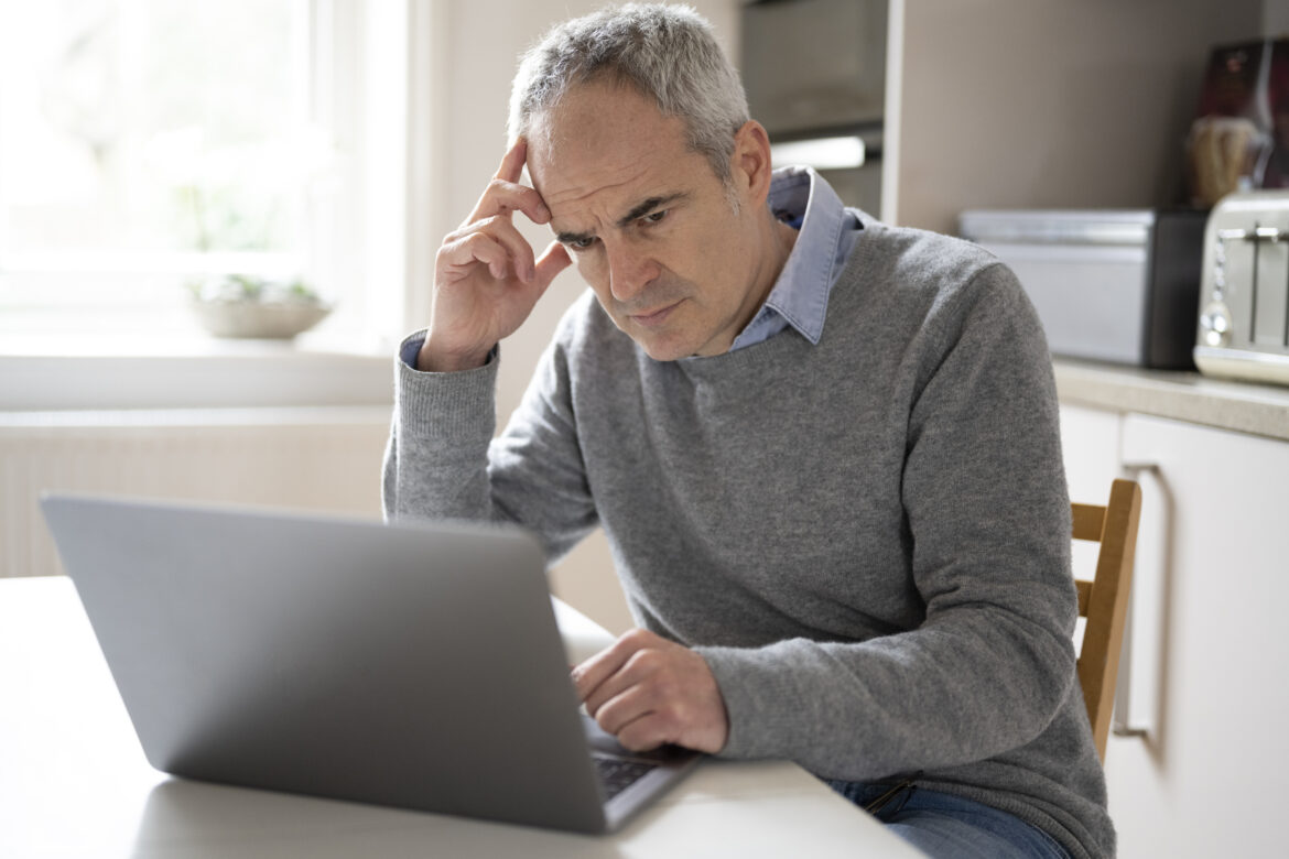 older-man-laptop-serious-gettyimages-1295467805.jpg