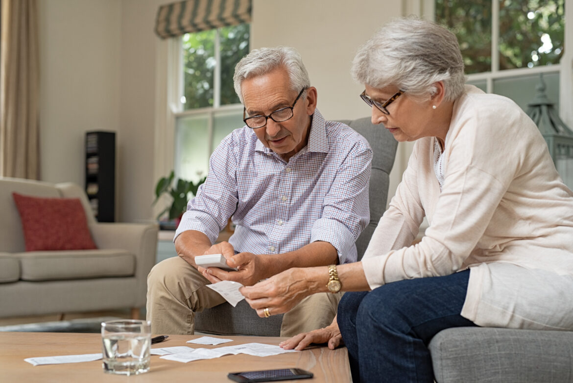 retired-couple-looking-at-financial-paperwork.jpg