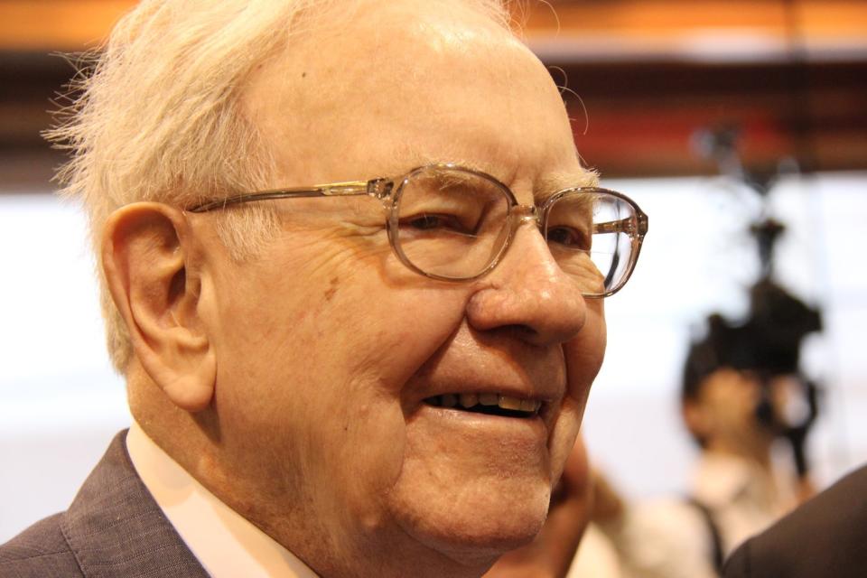 A jubilant Warren Buffett at Berkshire Hathaway's annual shareholder meeting.