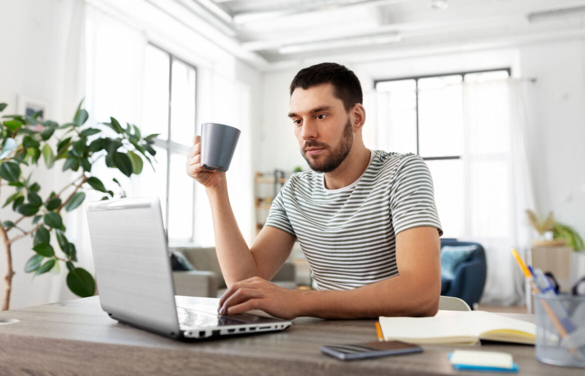 young-investor-sitting-at-desk.jpg